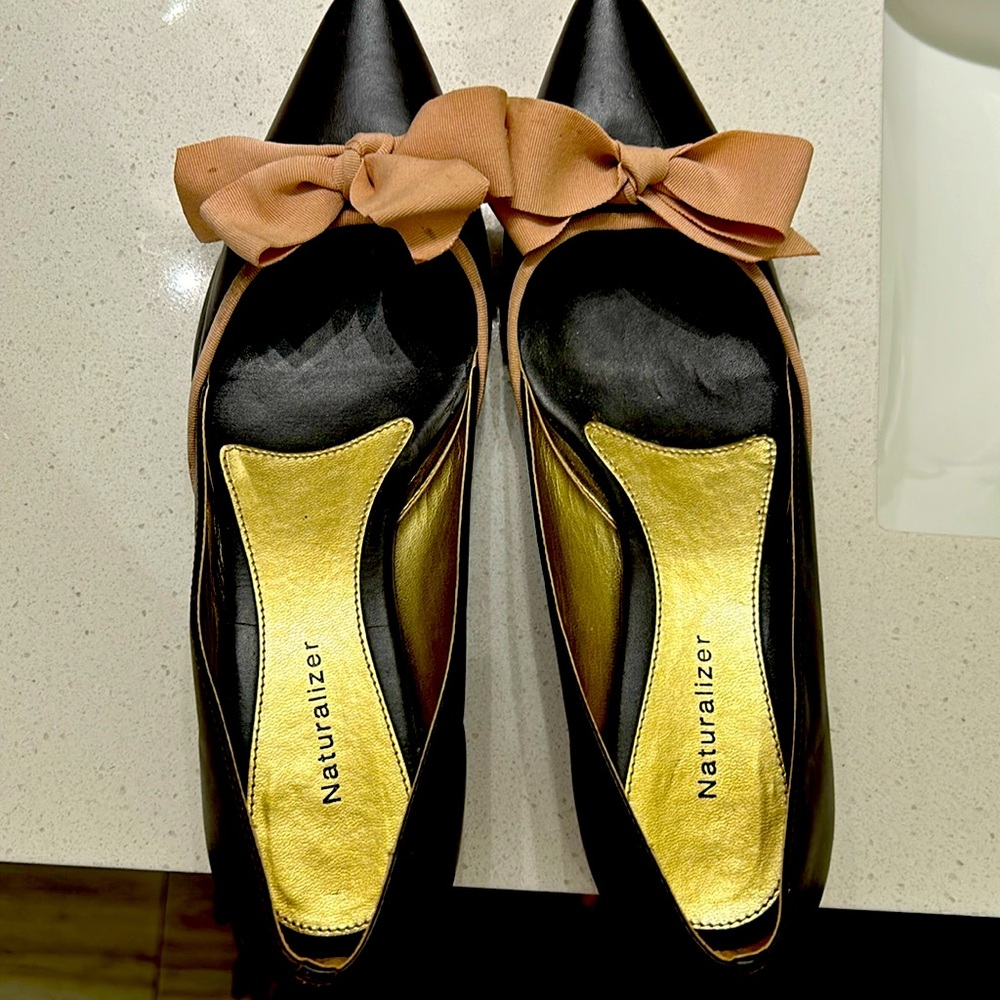 Brown and soft pink leather shoes.